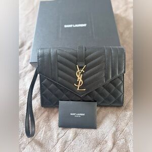 Yves Saint Laurent Black Quilted Clutch with Gold Logo
